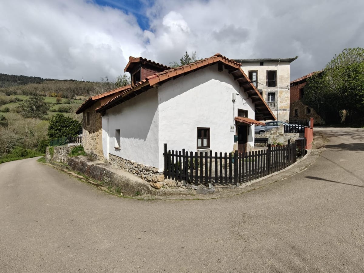 2 casas en 1 con jardín