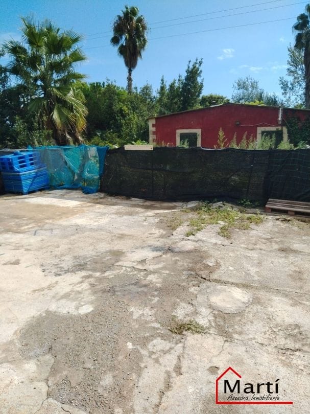 TERRENO RUSTICO CON 4 CASAS, EN TRAMITE REGISTRO